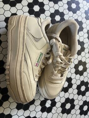 Reebok Cream Platform Sneakers with Green Logo Accent